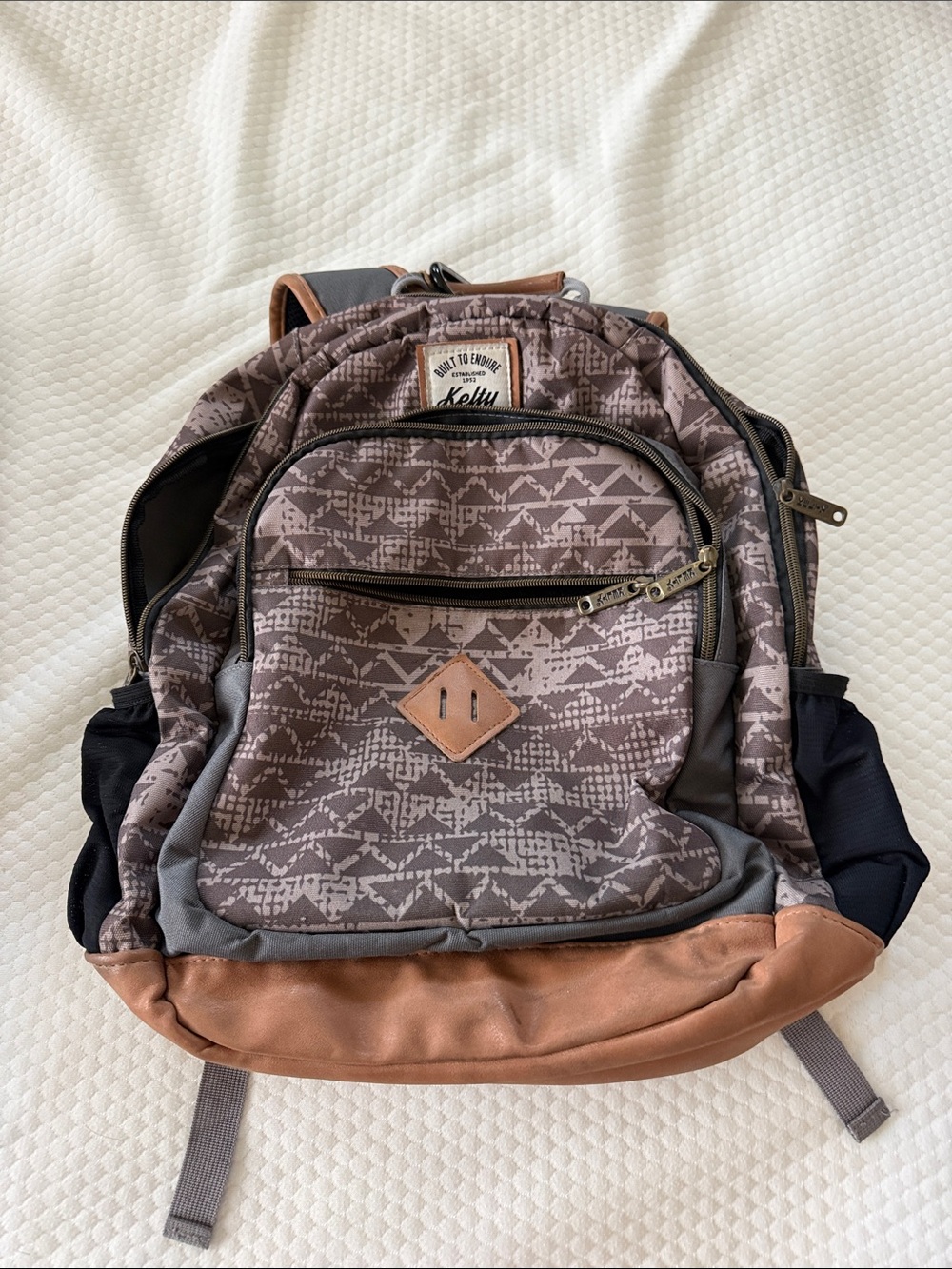 Brown Patterned Men's Backpack with Tan Trim